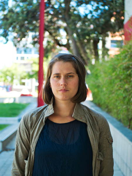 portrait of woman standing outside