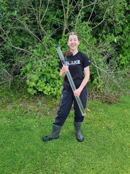 Amber is passionate about wetland restoration - and checking water clarity (with a clarity tube) is one of the ways to gauge wetland health.