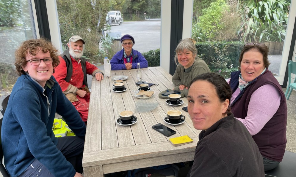 Ecological Restoration Team from front left: Connor Wallace, Tara MacDonald, Mandy Noffke and Esther Remnant. At the far end of the table are long time volunteers Budyong Hill and Jenny Easton (recently stepped down)