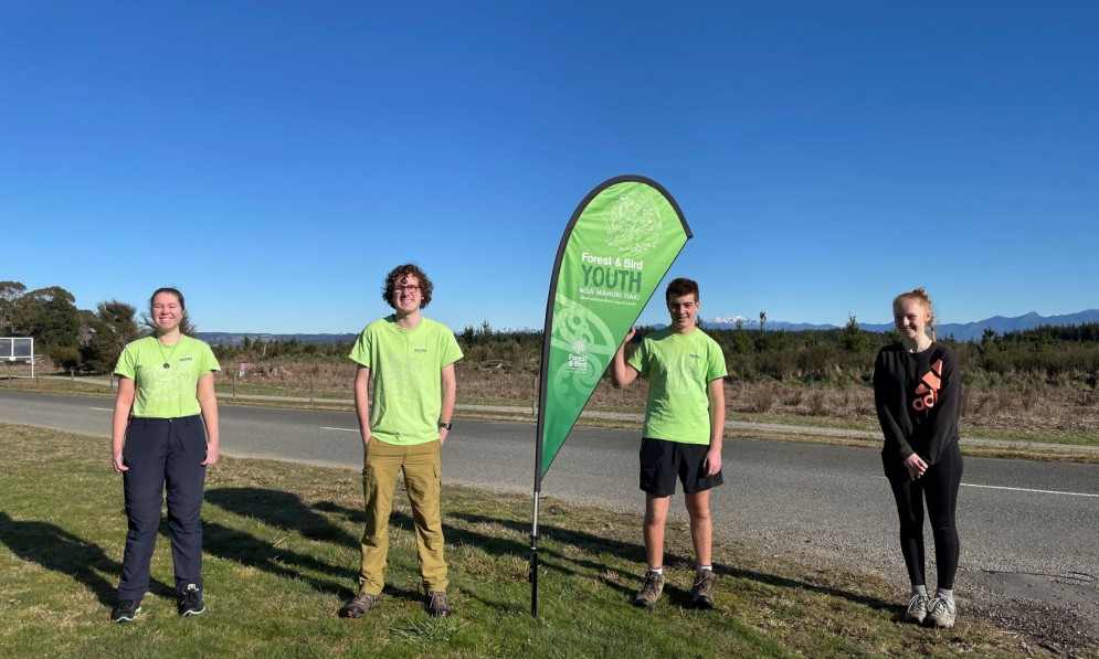 Nelson-Tasman hub youth members Maddy (far left) Nate (by the banner) & Evie (far right) with Youth Co-director Connor Wallace.