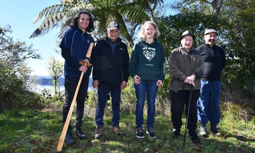 Lake Rotoiti Scenic Reserves Board members (from left) Keith Waaka, Ted Taiatini, Tawhiri Morehu, and Joe Tahana with Kate Graeme (middle). Fred Whata absent. Image Laura Smith, Rotorua Daily Post