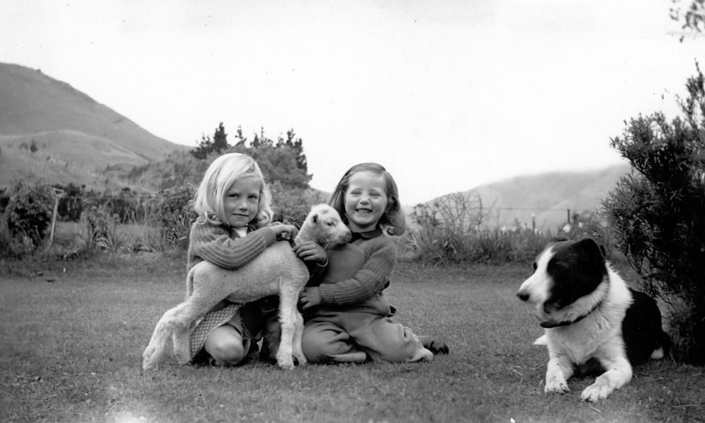 High Country sisters, Lesley and Diana Shand, on family farm with tiny pet lamb Moss (circa 1946-7)