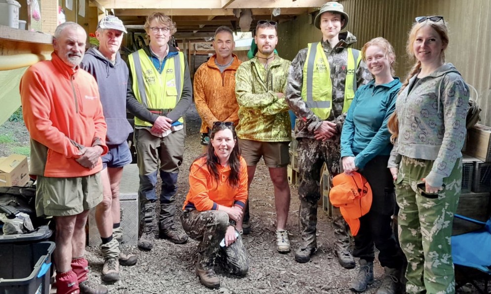 Abigail Hill (second from the right) with members of the Te Hoiere Bat Recovery team: Henry Neas, Aubrey Tai, Flynn Cowie, Oren Cranna-Powell, Daria Erastova, and Clare O'Rouke (front). Image supplied.
