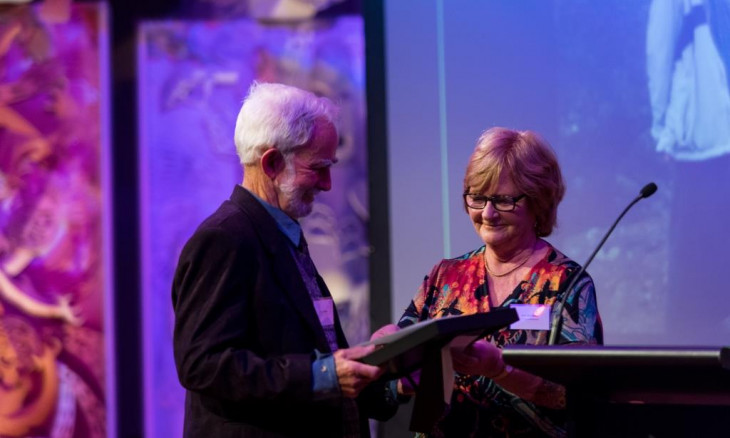 Roger Williams receiving the Old Blue Award