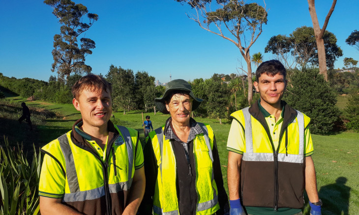 Anne Denny (centre) with two volunteers at Tuff Crater, North Shore