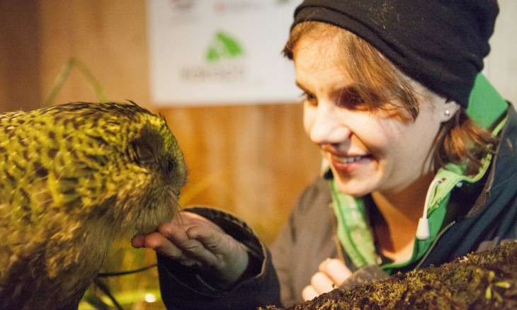 Nicola Toki, Chief Executive of Forest & Bird with a critically endangered kākāpō 