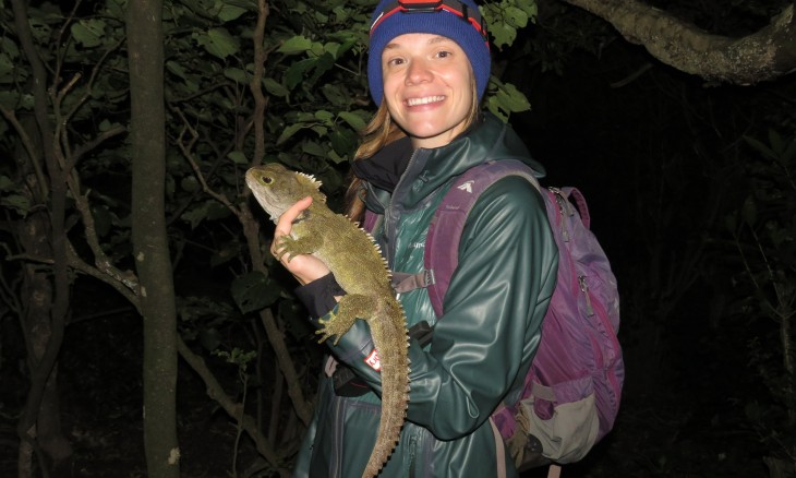 Ranger holding a tuatara