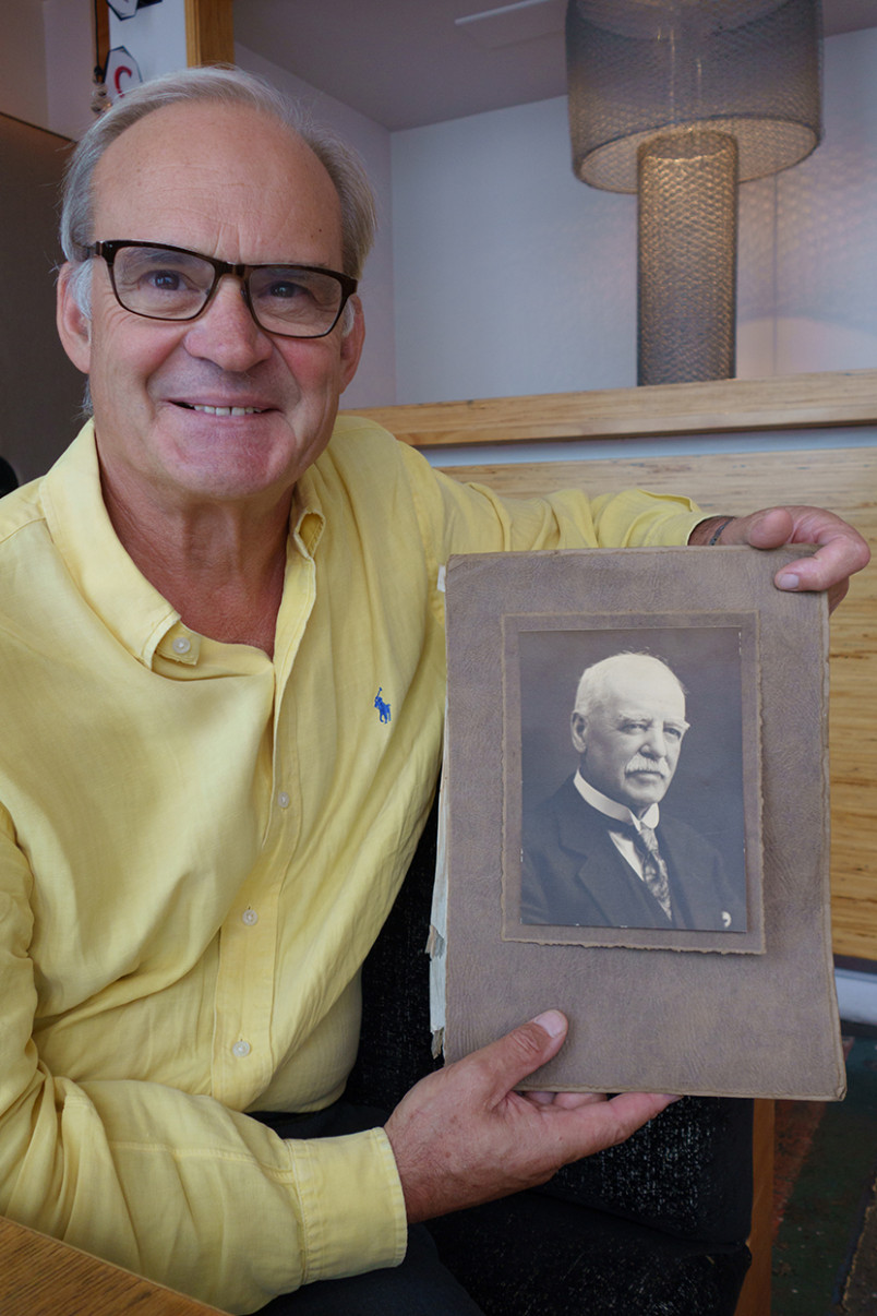 Rob Fenwick holds a photo of Sir George Fenwick, his great-grandad.